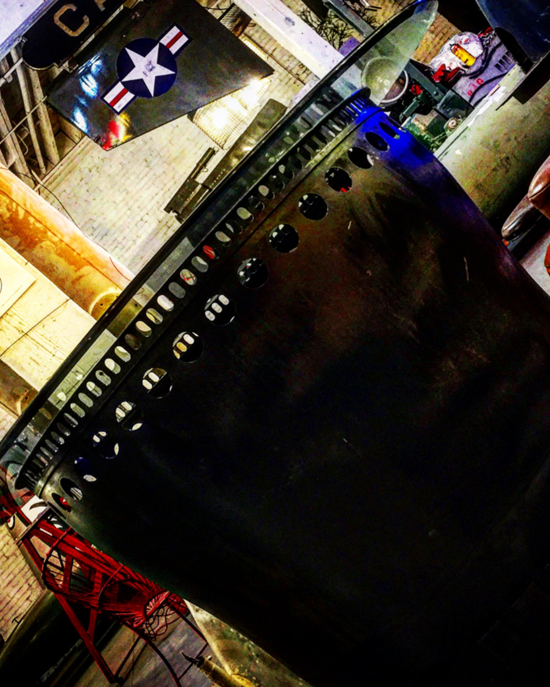 DCLA FAB upcycled F16 jet engine cowling converted into industrial bar table